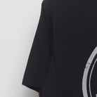 Close-up of the Left sleeve on the Vintage Y2K Graphic "Stay Grounded" T-Shirt - L