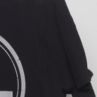 Close-up of the Right sleeve on the Vintage Y2K Graphic "Stay Grounded" T-Shirt - L