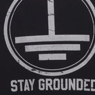 Close-up of the Right sleeve on the Vintage Y2K Graphic "Stay Grounded" T-Shirt - L