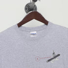 Close-up of the collar and tag on the Vintage Y2K Steamboat "Chipped Teeth Ride On" T-Shirt - M