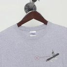 Close-up of the collar and tag on the Vintage Y2K Steamboat "Chipped Teeth Ride On" T-Shirt - M