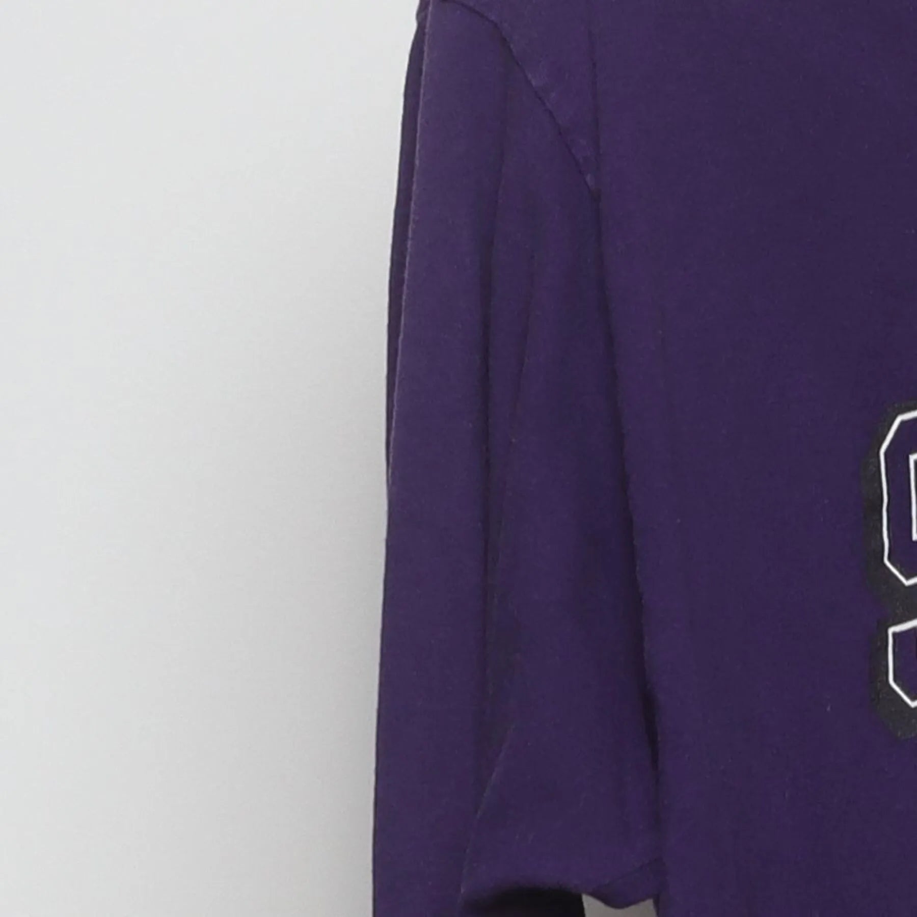 Close-up of the Left sleeve on the Vintage Y2K Champion "Stonehill College Skyhawks" T-Shirt - M