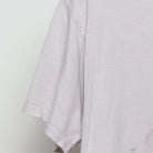 Close-up of the Left sleeve on the Vintage Y2K Britt Nicole "Pop Star Portrait" T-Shirt - M