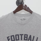 Close-up of the collar and tag on the Vintage Y2K Champion "Football" T-Shirt - M