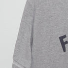 Close-up of the Left sleeve on the Vintage Y2K Champion "Football" T-Shirt - M