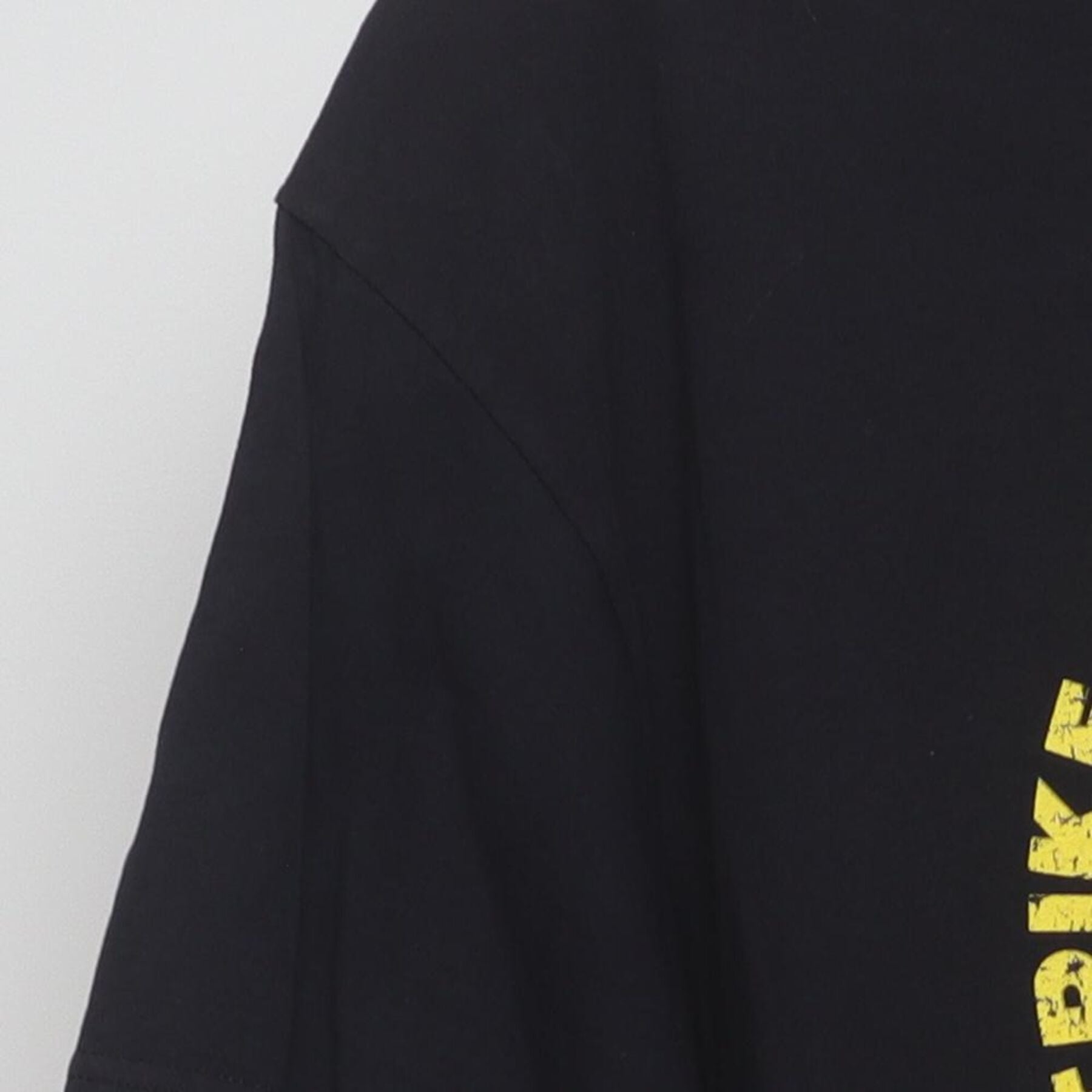 Close-up of the Left sleeve on the Vintage Y2K Cobra Kai "Strike First Strike Hard No Mercy" T-Shirt - L