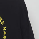 Close-up of the Right sleeve on the Vintage Y2K Cobra Kai "Strike First Strike Hard No Mercy" T-Shirt - L