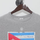 Close-up of the collar and tag on the Vintage Y2K Royal Caribbean "Cuba Souvenir Stamp" T-Shirt - M