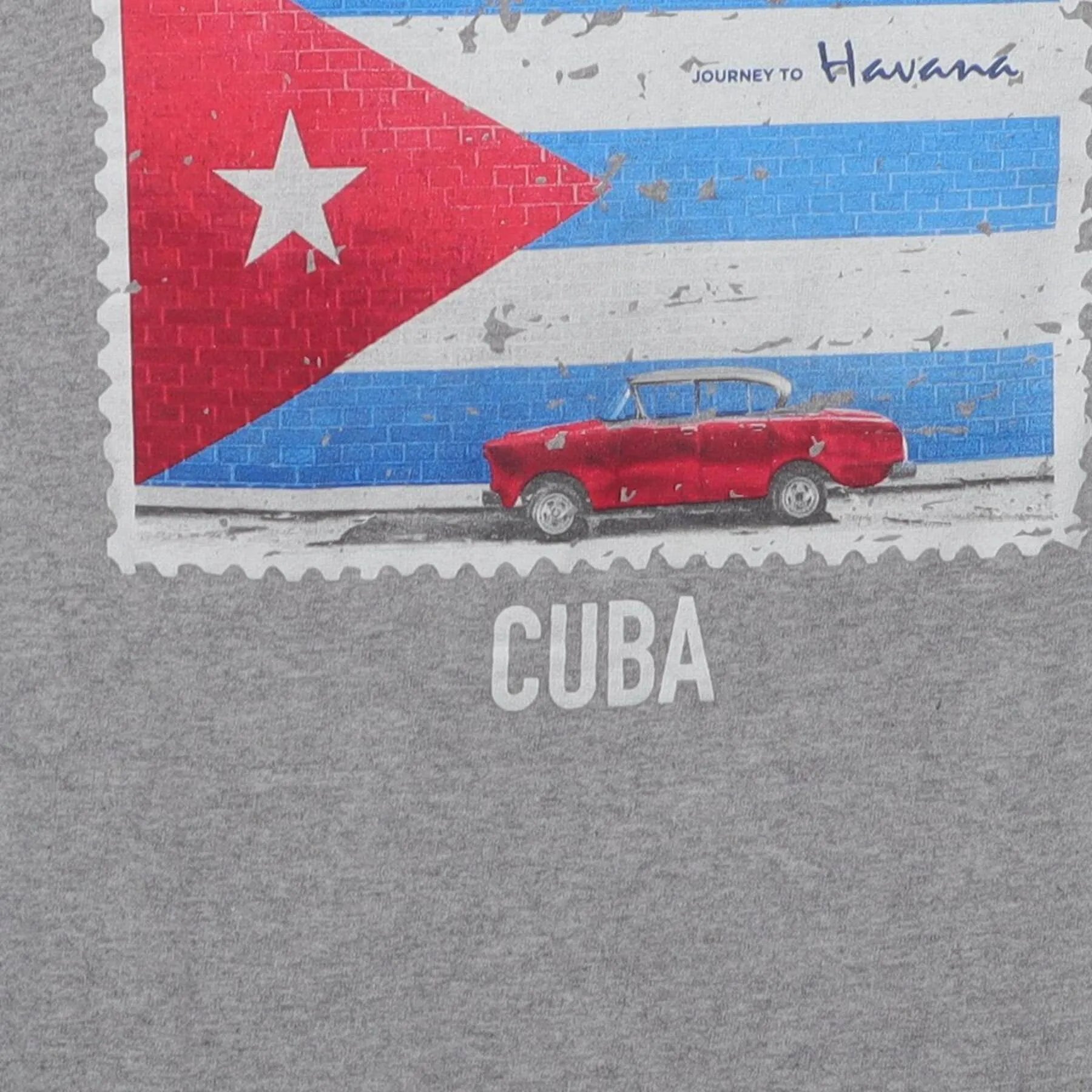 Close-up of the main graphic on the Vintage Y2K Royal Caribbean "Cuba Souvenir Stamp" T-Shirt - M