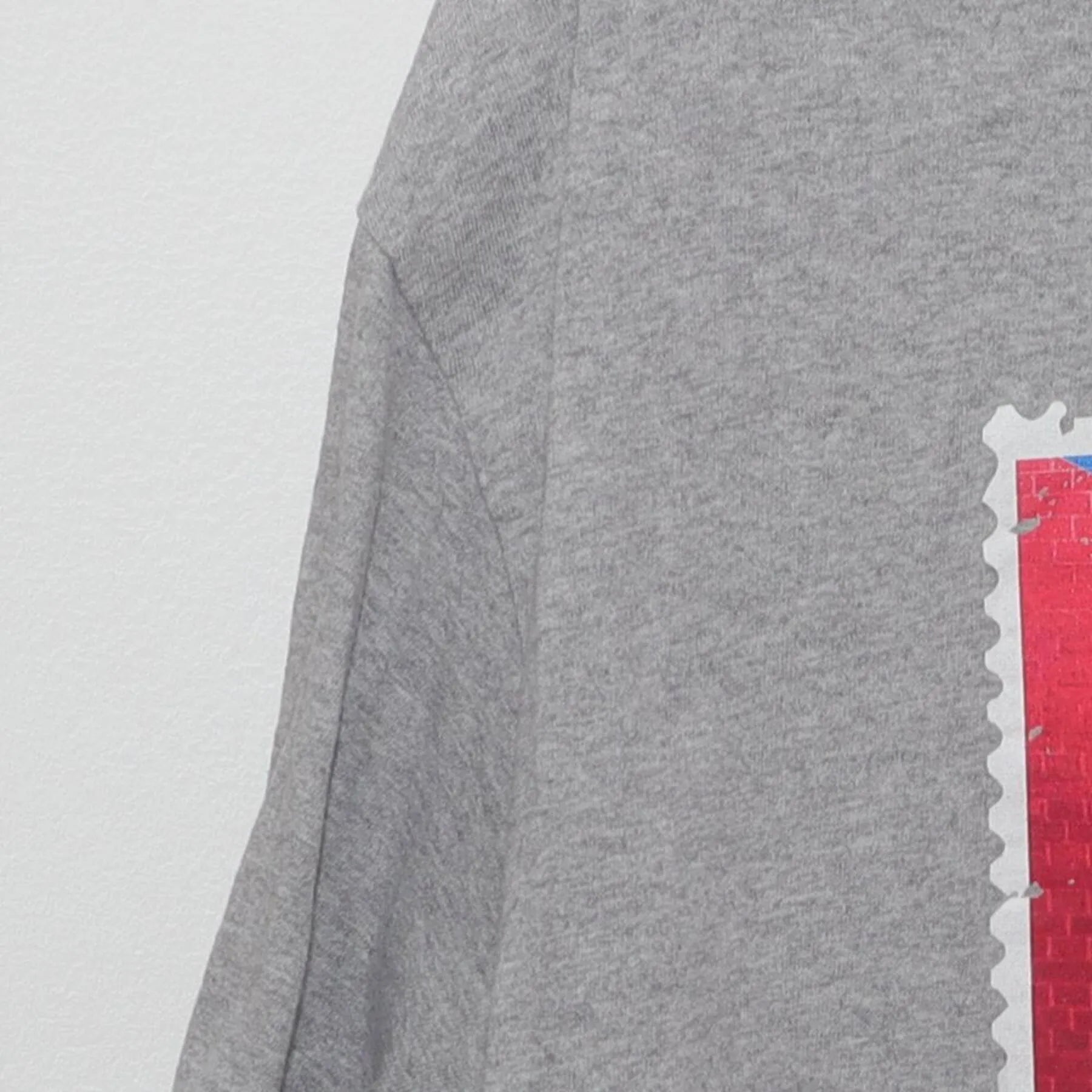 Close-up of the Left sleeve on the Vintage Y2K Royal Caribbean "Cuba Souvenir Stamp" T-Shirt - M