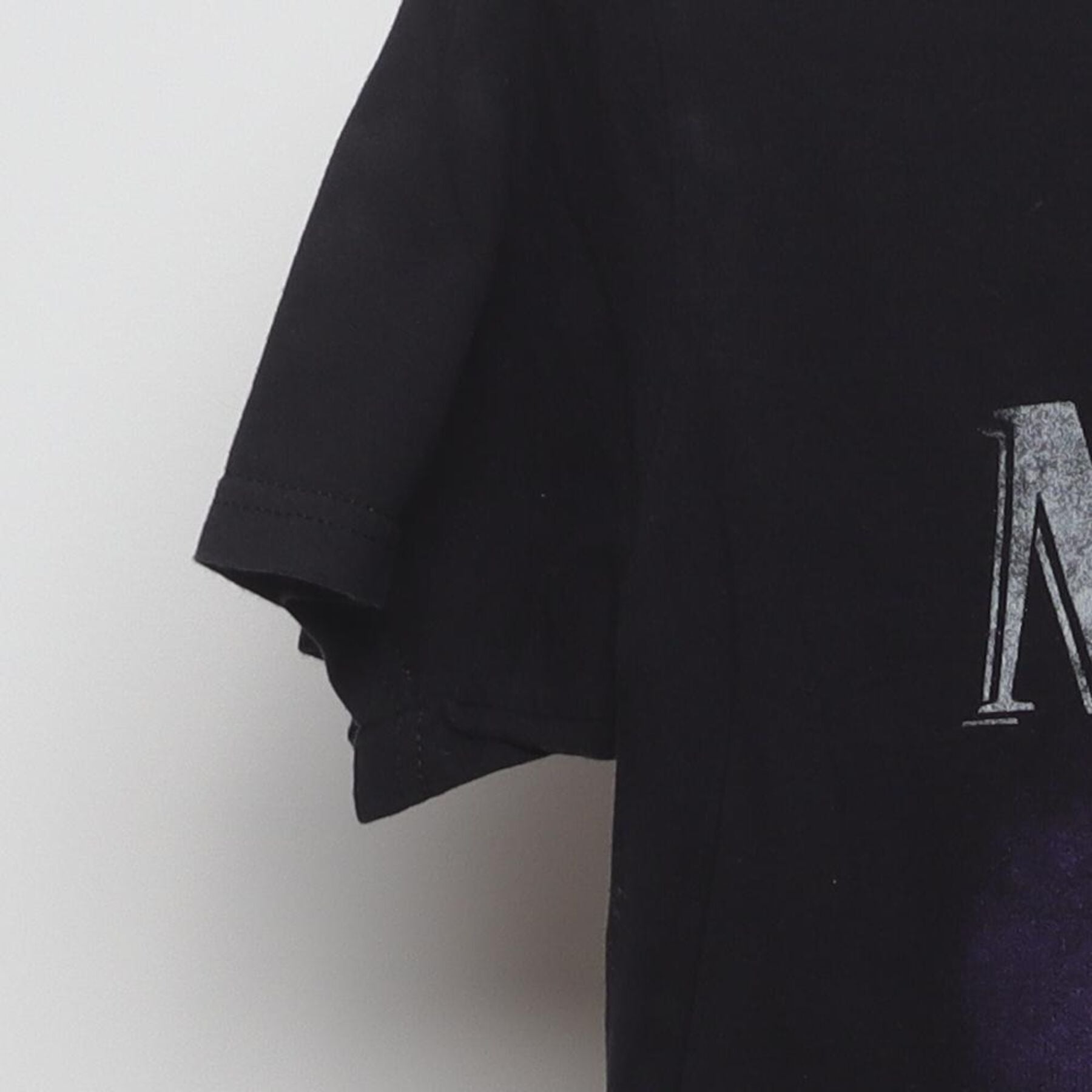 Close-up of the Left sleeve on the Vintage Y2K Disney "The Little Mermaid Silhouette" T-Shirt - XS