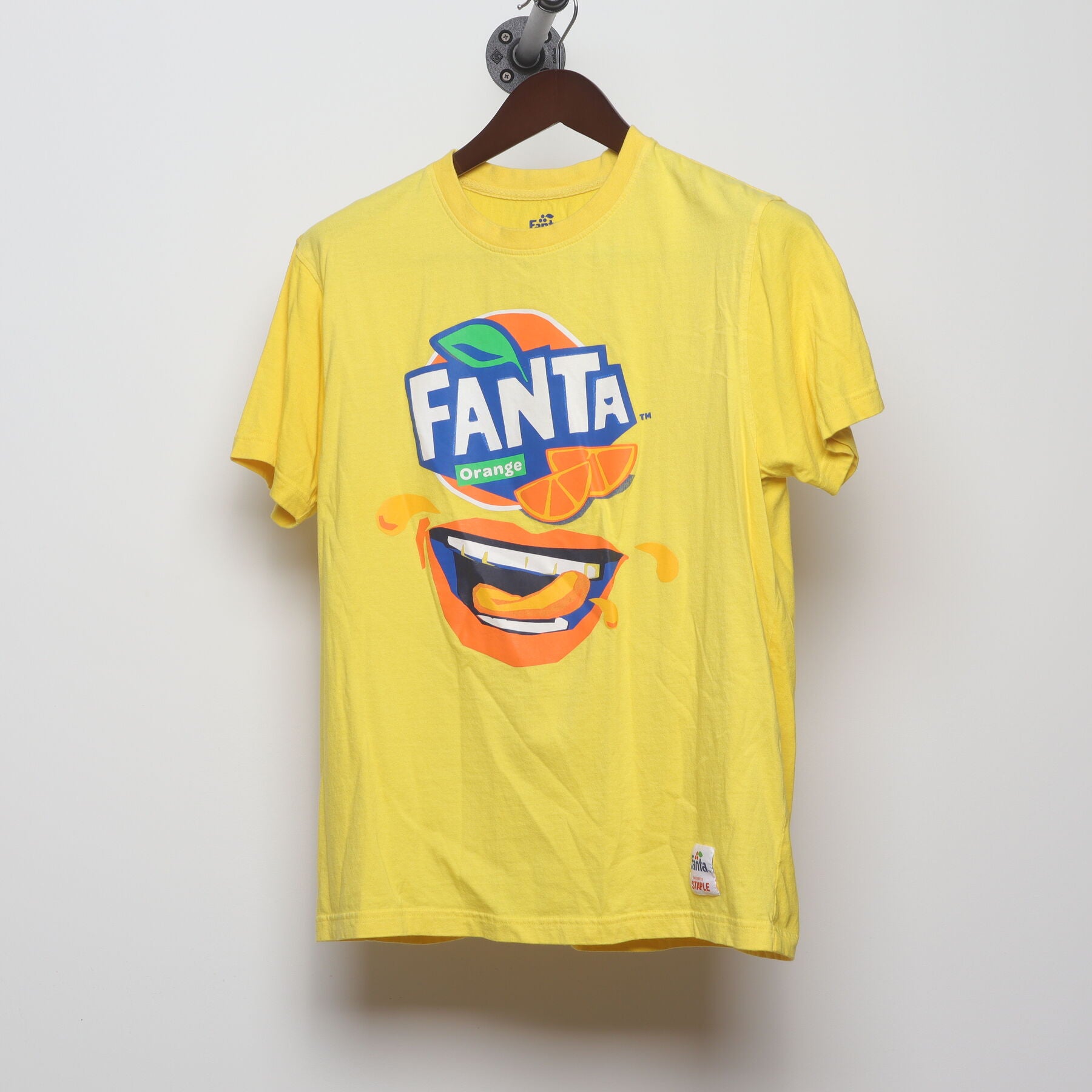 Front view of Vintage Y2K Fanta "Orange Face Logo" T-Shirt - M