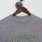 Close-up of the collar and tag on the Vintage Y2K Guinness "Dublin Ireland Shamrock" T-Shirt - S