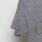 Close-up of the Left sleeve on the Vintage Y2K Guinness "Dublin Ireland Shamrock" T-Shirt - S