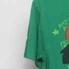Close-up of the Left sleeve on the Vintage Y2K Home Alone "Battle Plan" T-Shirt - S