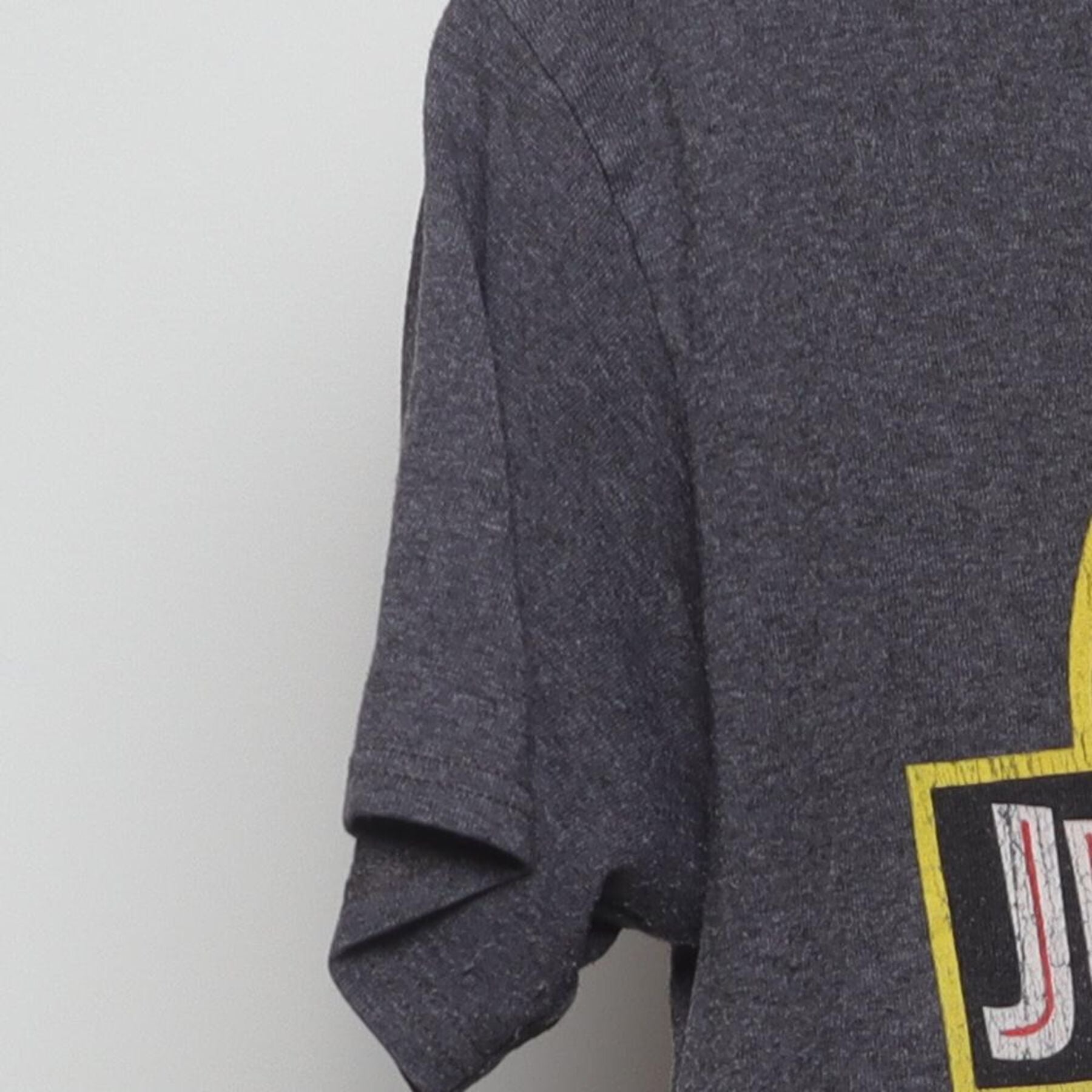 Close-up of the Left sleeve on the Vintage Y2K Jurassic Park "Classic Logo" T-Shirt - M