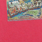 Close-up of the main graphic on the Vintage Y2K OBX Running Company "Greetings from OBX" Postcard T-Shirt - S