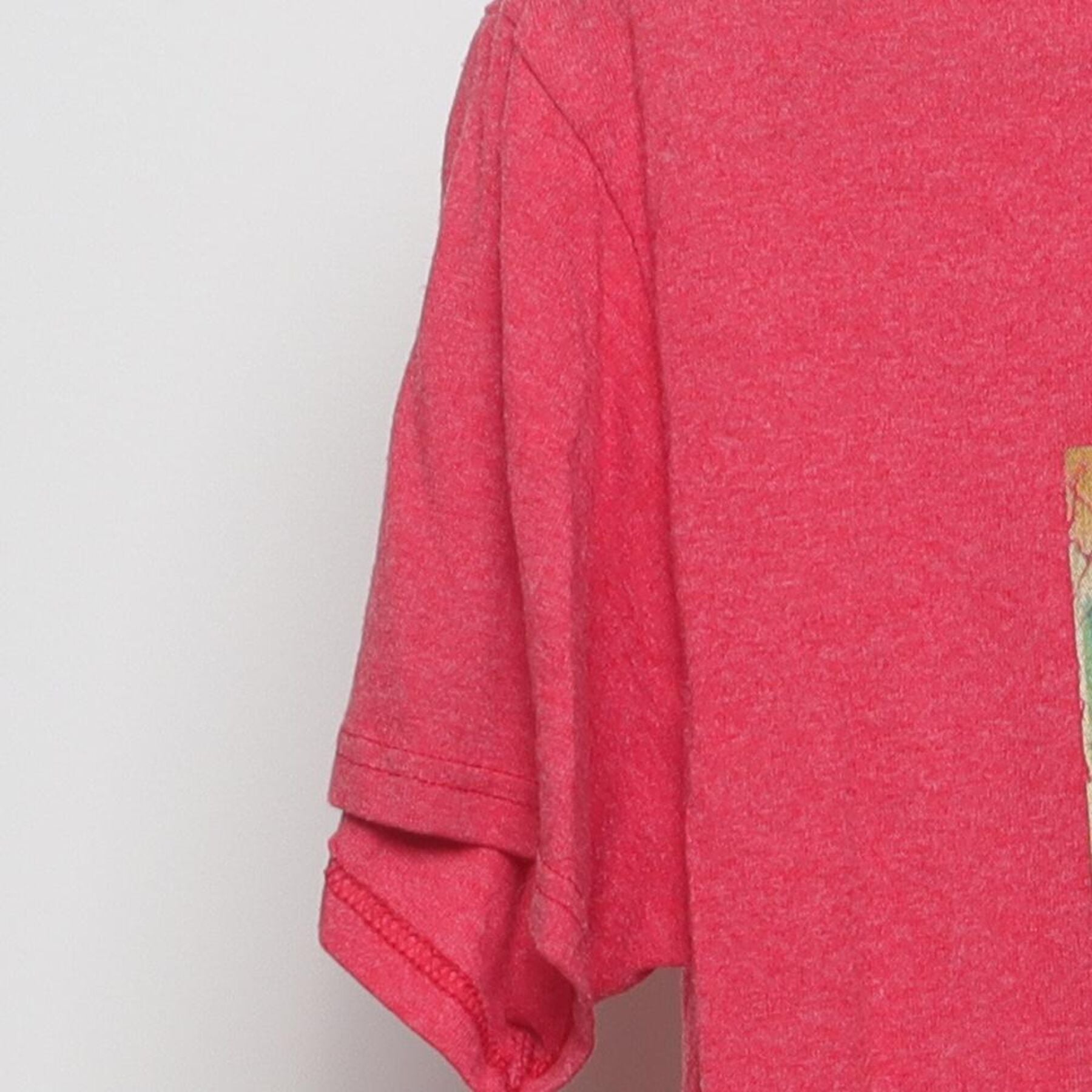 Close-up of the Left sleeve on the Vintage Y2K OBX Running Company "Greetings from OBX" Postcard T-Shirt - S
