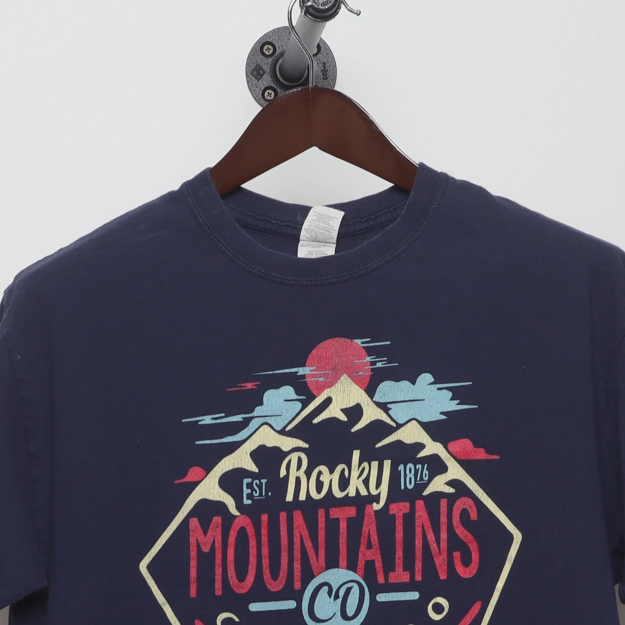Close-up of the collar and tag on the Vintage Style Rocky Mountains Souvenir T-Shirt M