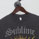 Close-up of the collar and tag on the Vintage Y2K Sublime "40oz. to Freedom Sun" T-Shirt - M