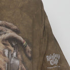 Close-up of the Right sleeve on the Vintage Y2K The Mountain "Reggae Lion" T-Shirt - XL