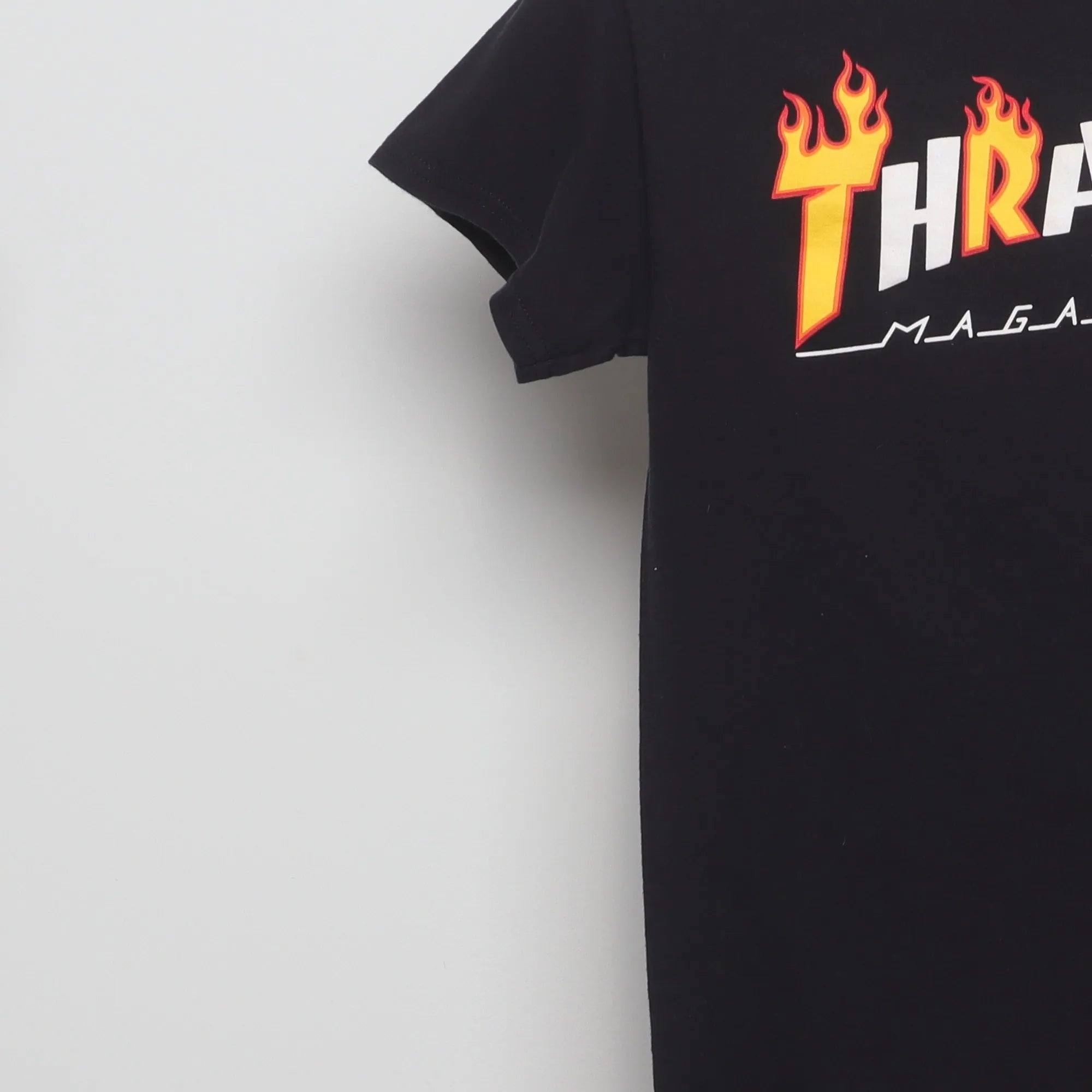 Close-up of the sleeve on the Vintage Thrasher Flame Logo Skate T-Shirt S