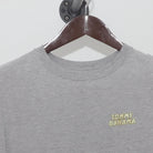 Close-up of the collar and tag on the Vintage Y2K Tommy Bahama "Grill Sergeant" T-Shirt - L
