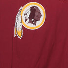 Close-up of the main graphic on the Vintage Y2K Washington Redskins "NFL Football Logo" T-Shirt - M