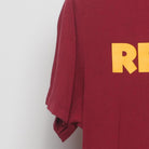 Close-up of the Left sleeve on the Vintage Y2K Washington Redskins "NFL Football Logo" T-Shirt - M