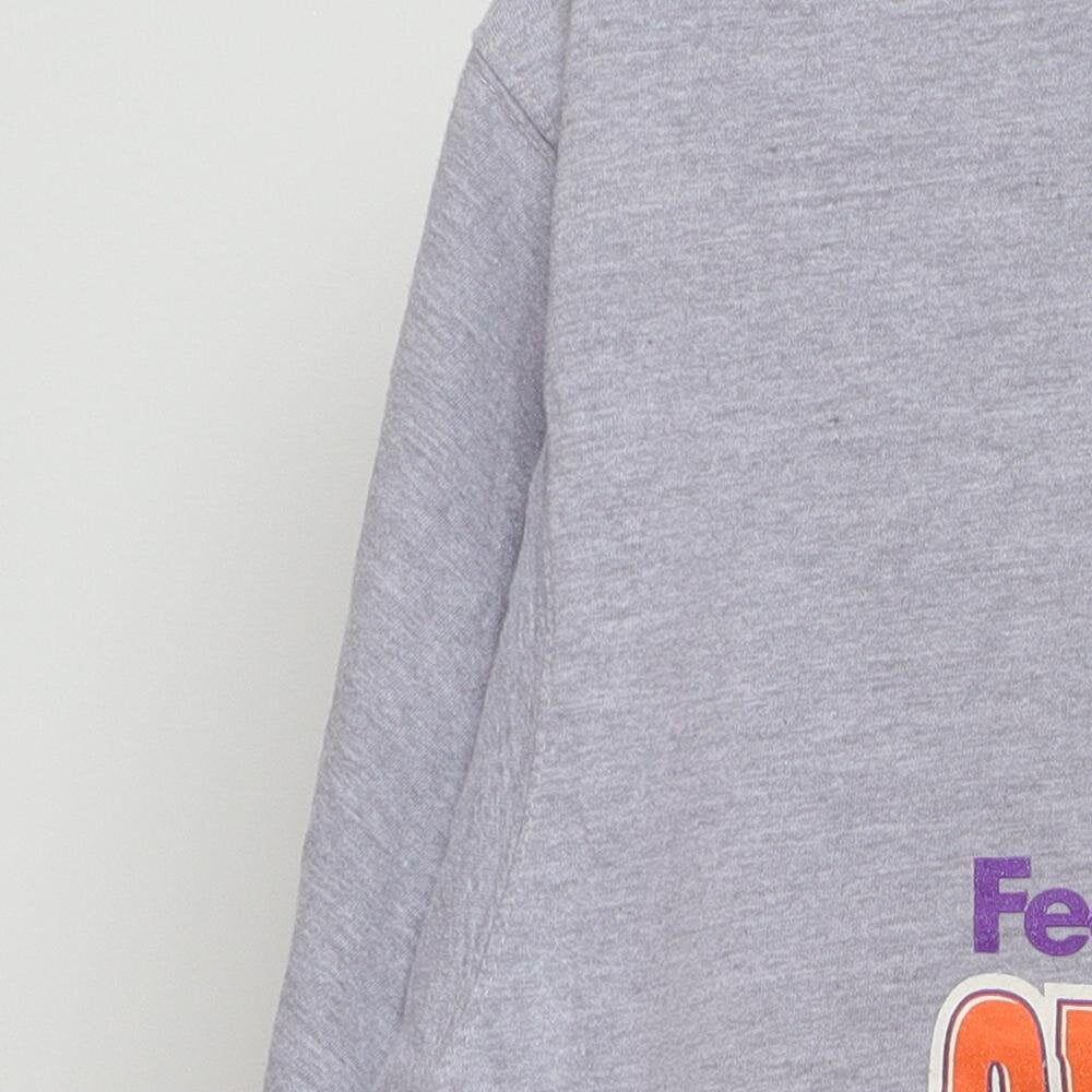 Close-up of the sleeve on the Vintage Y2K 2005 Orange Bowl "Oklahoma Sooners" T-Shirt - XL