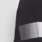 Close-up of the Left sleeve on the Vintage Y2K Adidas "Pixelated Bar Logo" T-Shirt - L