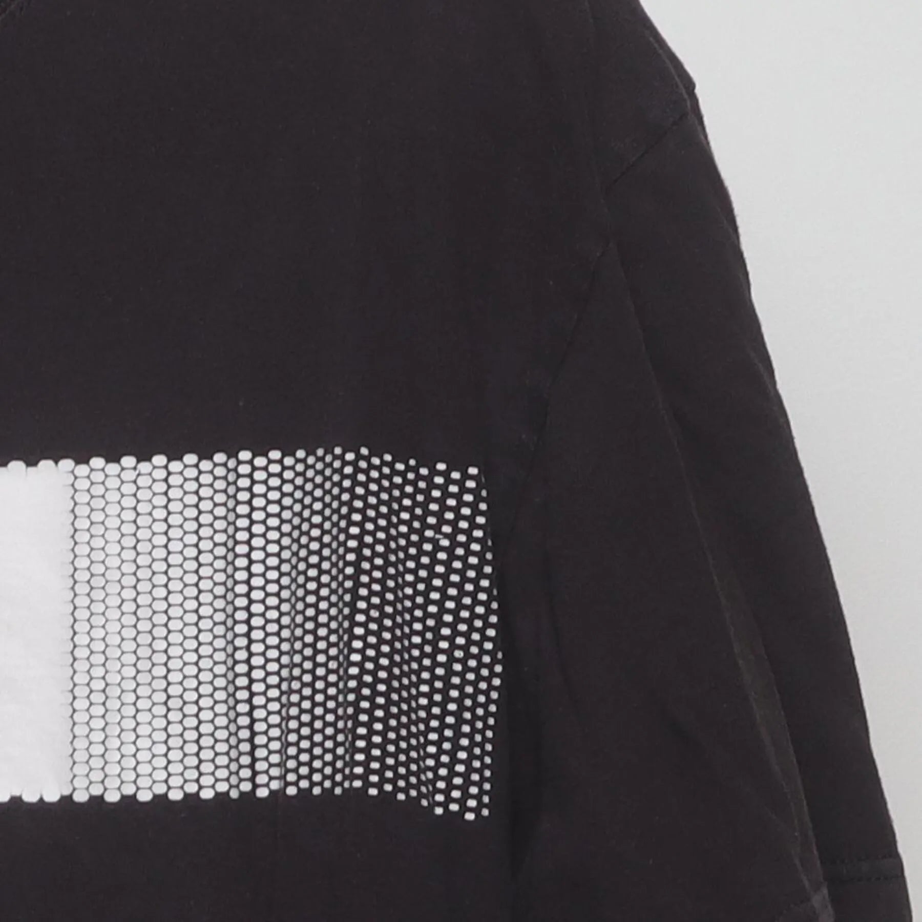 Close-up of the Right sleeve on the Vintage Y2K Adidas "Pixelated Bar Logo" T-Shirt - L