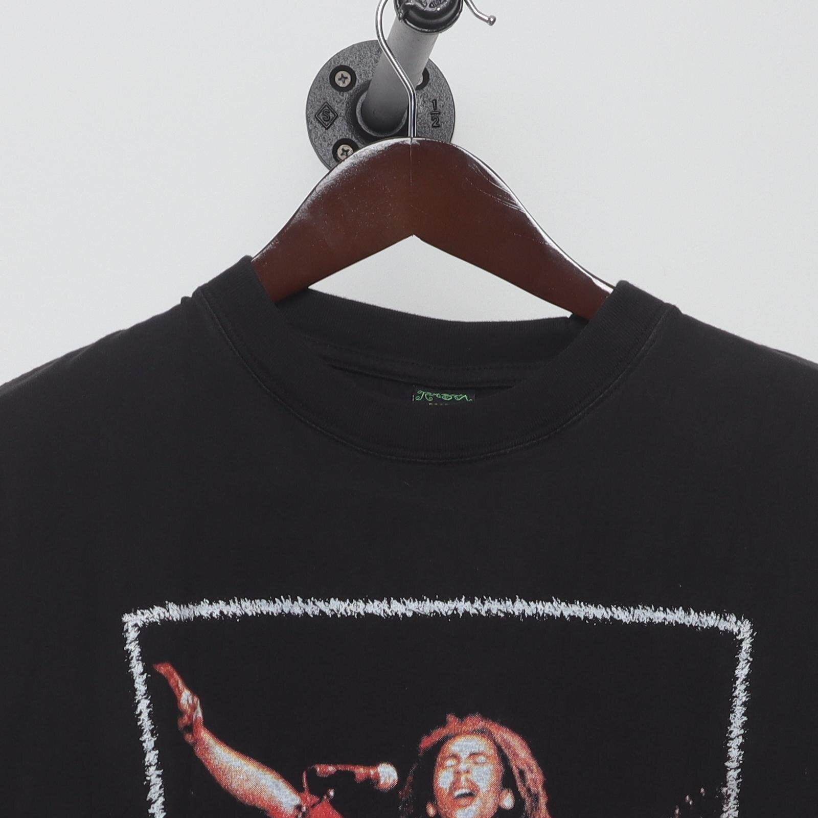 Close-up of the collar and tag on the Vintage Y2K Bob Marley "Live Performance" T-Shirt - M
