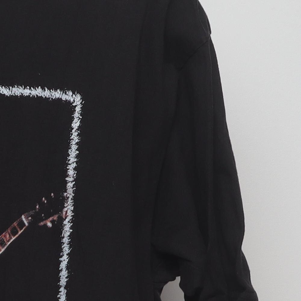 Close-up of the sleeve on the Vintage Y2K Bob Marley "Live Performance" T-Shirt - M