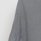 Close-up of the sleeve on the Vintage Y2K Budweiser "Surf Shack" T-Shirt - L