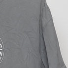 Close-up of the sleeve on the Vintage Y2K Budweiser "Surf Shack" T-Shirt - L