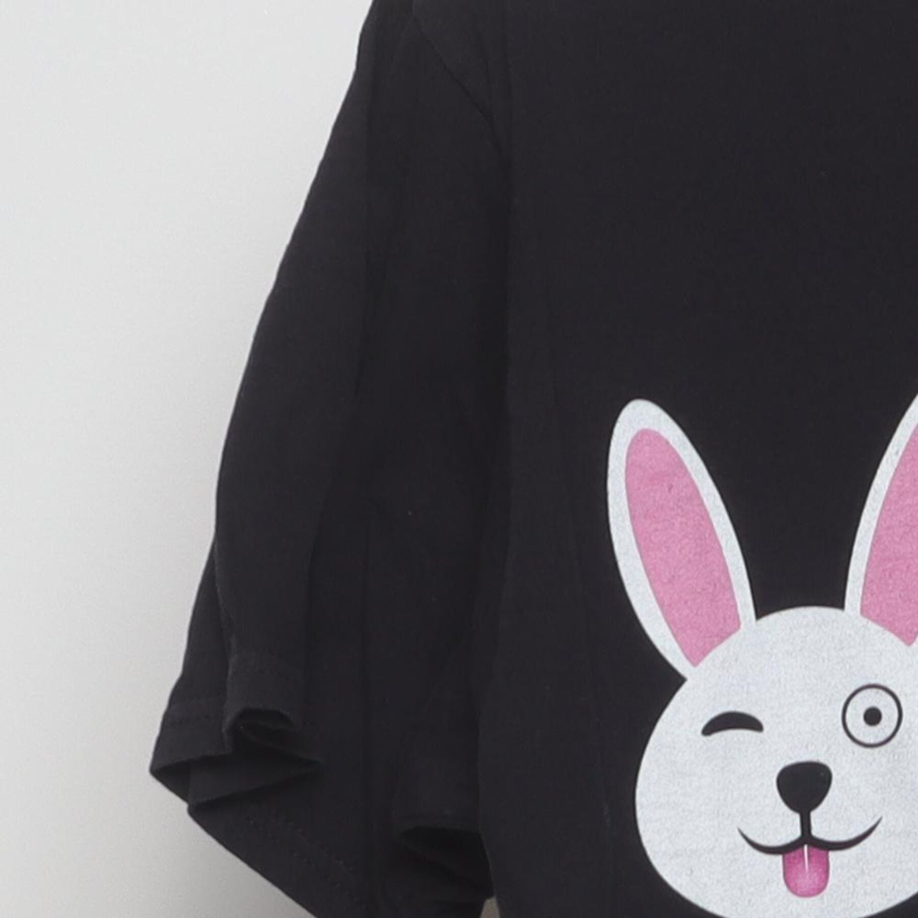 Close-up of the Left sleeve on the Vintage Y2K Gildan "Bunny Emojis" T-Shirt - S