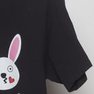 Close-up of the Right sleeve on the Vintage Y2K Gildan "Bunny Emojis" T-Shirt - S