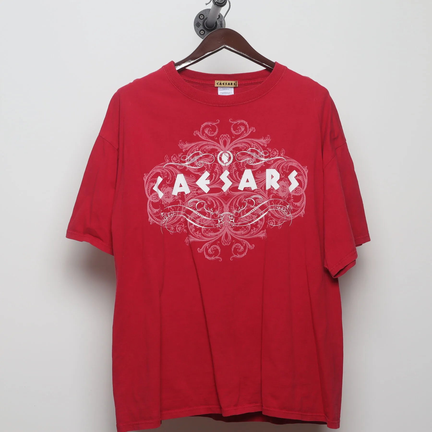 Front view of Vintage Y2K Caesars "Ornate Logo" T-Shirt - XL