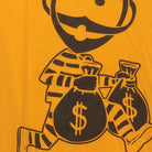 Close-up of the main graphic on the Vintage Y2K Crooks & Castles "Running Crook Mascot" T-Shirt - M