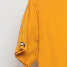 Close-up of the Left sleeve on the Vintage Y2K Crooks & Castles "Running Crook Mascot" T-Shirt - M