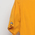 Close-up of the Left sleeve on the Vintage Y2K Crooks & Castles "Running Crook Mascot" T-Shirt - M