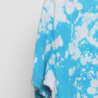 Close-up of the sleeve on the Vintage Y2K Custom "Splatter Bleach Dye" T-Shirt - M