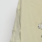 Close-up of the sleeve on the Vintage Y2K Disney / Pixar "Finding Nemo Mine Mine" T-Shirt - XL