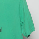 Close-up of the Right sleeve on the Vintage Y2K Ebbets Field Flannels "Clearing Question Marks" T-Shirt - M