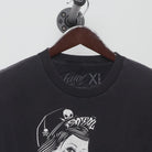 Close-up of the collar and tag on the Vintage Y2K Fatal "Tattoo Pinup" T-Shirt - XL