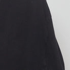 Close-up of the sleeve on the Vintage Y2K Fatal "Tattoo Pinup" T-Shirt - XL