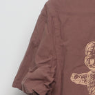Close-up of the sleeve on the Vintage Y2K Graphic "Teddy Bear Pile" T-Shirt - L