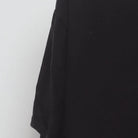 Close-up of the sleeve on the Vintage Y2K Harley-Davidson "Bar & Shield Logo" T-Shirt - M