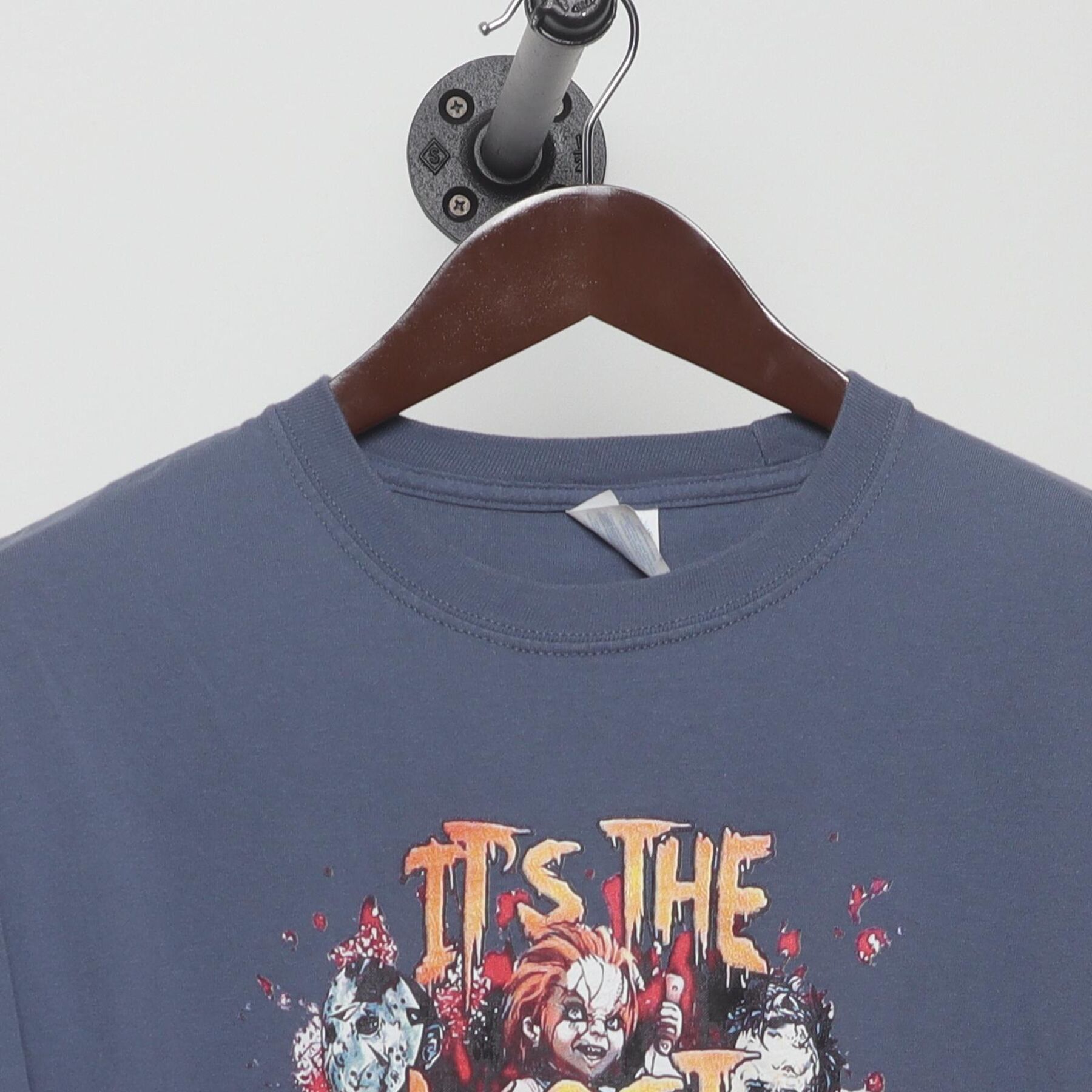Close-up of the collar and tag on the Vintage Y2K Horror Movie Villains "Most Wonderful Time Of The Year" T-Shirt - L